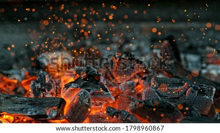 Barbecue Grill Pit With Glowing And Flaming Hot Charcoal Briquettes, Close-Up Imagine de stoc © 