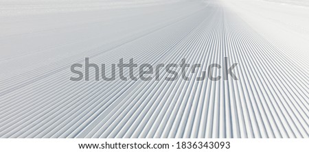 Similar – Image, Stock Photo Groomed ski trails for cross-country skiing in winter landscape in valley Studen, Switzerland famous for winter sport. Flat landscape is surrounded by mountains and illuminated by midday sun.