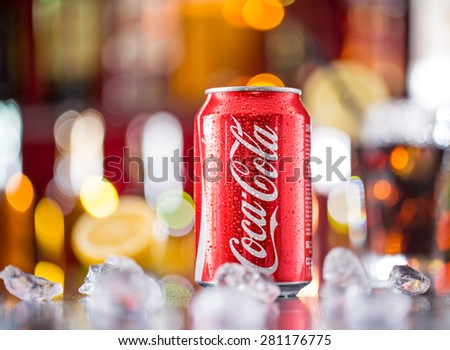 PRAGUE, CZ - APRIL 6, 2015: Can of Coca-Cola on bar desk, close-up. Coca-Cola Company is the leading manufacturer of soda drinks in the world.