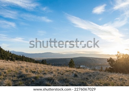 Similar – Image, Stock Photo Sunset sky over mountain ridge