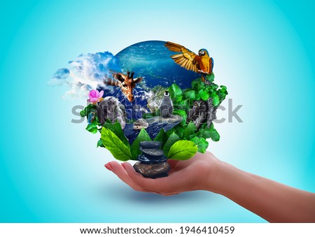 Hand holding Earth engulfed in leaves, cute wild animals, lush greenery – leaves and water. Protect the environment and Earth day concept
