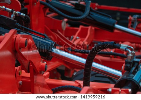 Similar – Image, Stock Photo Farmer repairing detail of agricultural machine