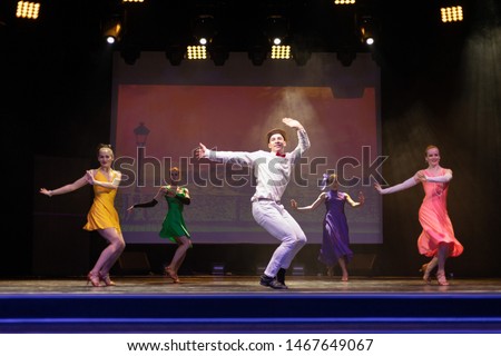 Dancer Actors perform on the theater stage in a dance show musical