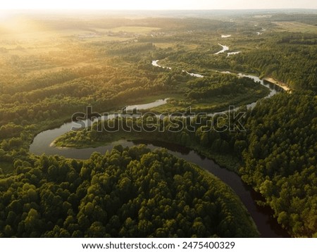 Similar – Foto Bild Luftaufnahme einer ländlichen Landschaft. Mähdrescher arbeitet im Feld, sammelt Samen. Ernte von Weizen im Spätsommer. Landwirtschaftliche Maschine Sammeln Golden Ripe. Vogelperspektive Drohne Ansicht