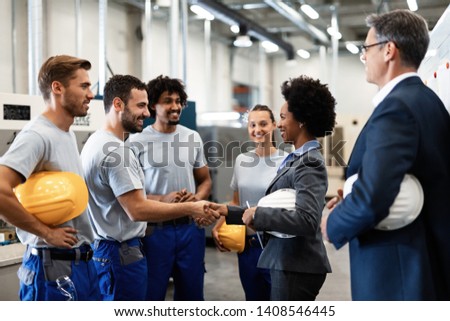 Similar – Image, Stock Photo Ethnic happy businessman shaking hands with partner and looking at camera