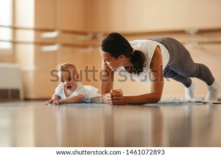 Similar – Image, Stock Photo Young focused ethnic sportswoman on street before training