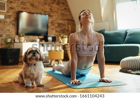 Similar – Image, Stock Photo Young athletic woman training at seaside