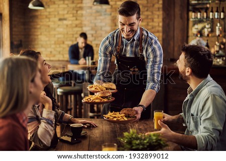 Similar – Foto Bild Freunde haben Spaß beim gemeinsamen Biertrinken.