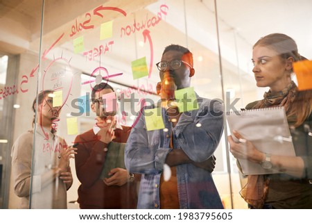 Similar – Image, Stock Photo Focused woman with map sitting near camping tent in nature