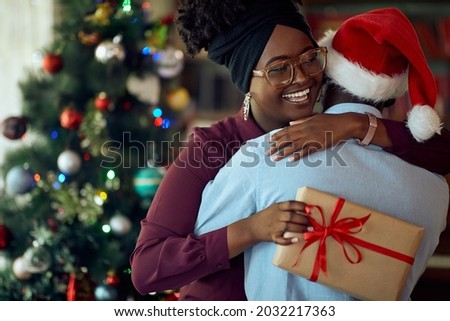 Similar – Image, Stock Photo Young couple enjoying Christmas Lights