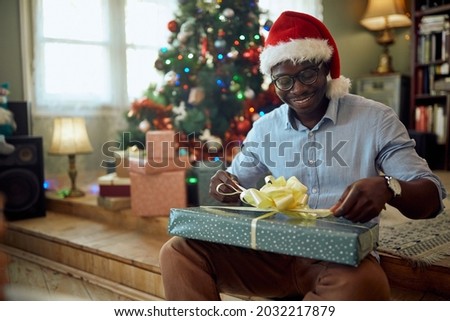 Similar – Image, Stock Photo Black man wrapping in American Flag outside