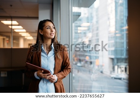 Similar – Image, Stock Photo Businesswoman looking at her colleague who is wearing funny glasses because he is going on vacation