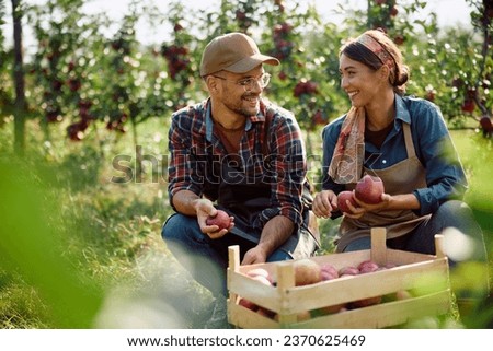 Similar – Image, Stock Photo Apple harvest or man with hat sits under a ripe apple tree