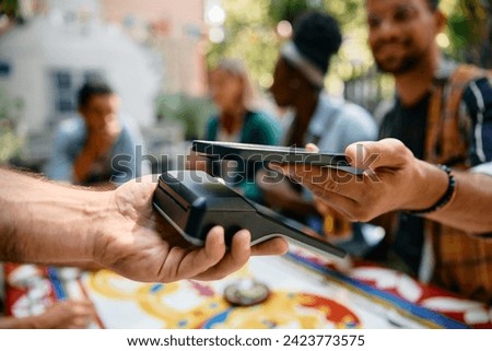 Similar – Image, Stock Photo Woman paying with mobile a take away order