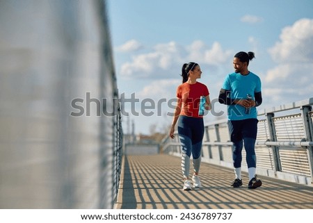 Similar – Image, Stock Photo Happy African American sportswoman with bottle of water