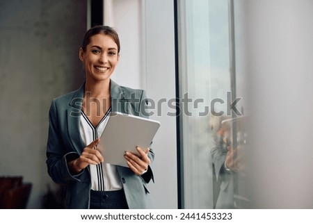 Similar – Image, Stock Photo Woman with tablet in stylish suit lying in grass