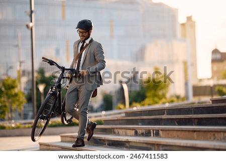 Similar – Image, Stock Photo businessman commuting  in the city