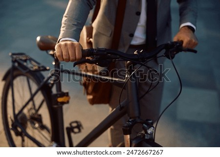 Similar – Image, Stock Photo businessman commuting  in the city