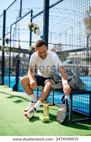 Similar – Image, Stock Photo Paddle tennis player with surgery mask