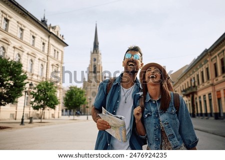 Similar – Image, Stock Photo tourist walking on the street visiting Bilbao city, Spain