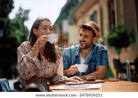 Similar – Image, Stock Photo Happy young couple drinking beverages outdoors