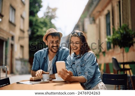 Similar – Image, Stock Photo Happy young couple drinking beverages outdoors