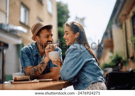 Similar – Image, Stock Photo Happy young couple drinking beverages outdoors