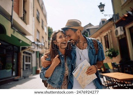 Similar – Image, Stock Photo tourist walking on the street in Bilbao city, Spain