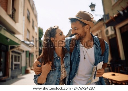 Similar – Image, Stock Photo Happy couple walking on sea