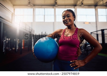 Similar – Image, Stock Photo Happy African American sportswoman with bottle of water