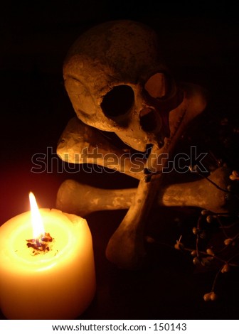 Skull and cross-bones in shadow