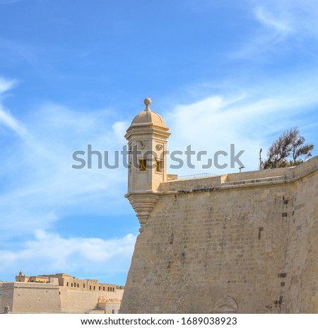 The Vedette Watchtower at the tip of the peninsula in Senglea, Malta. It is carved with an ear and an eye. Stock fotó © 