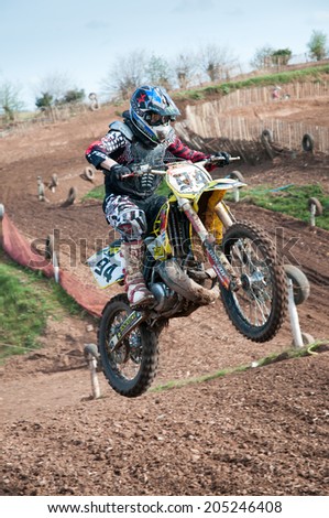 WORCESTER,UK - APRIL 05 2009 :Competitors taking part in a Motocross race.Motocross is a popular motor sport with venues in many countries around the world.Youngsters as young as 4  can take part