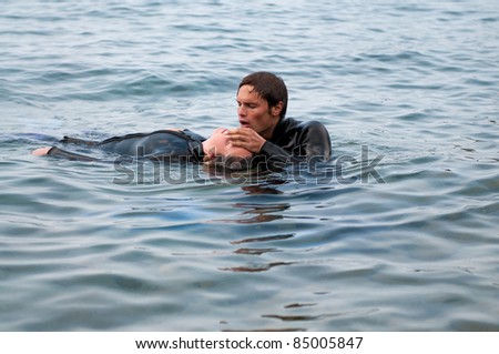 Diver giving CPR to a diving casualty