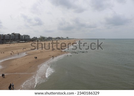 Similar – Image, Stock Photo Scheveningen beach in the evening with a view of the lighthouse and Ferris wheel