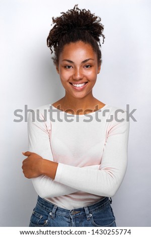 Similar – Image, Stock Photo Charming woman in light white dress on wavy beach