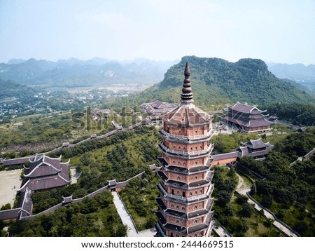 Image, Stock Photo Bai Dinh Tower Pagoda at the end of the winding road between the trees. . The biggest temple complex in Vietnam. Trang An, Nim Binh.