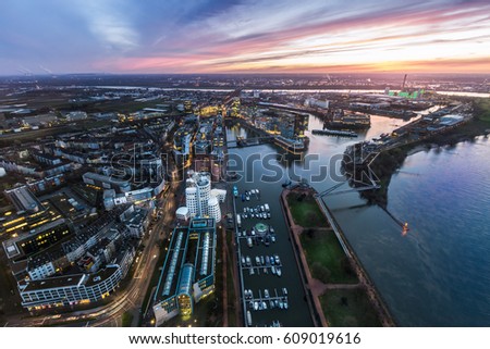 Similar – Image, Stock Photo aerial view of dusseldorf at sunset with the Rheinknie Bridge