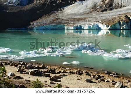 Glacier lake and ice under mountain edith cavell in august, jasper national park, alberta, canada