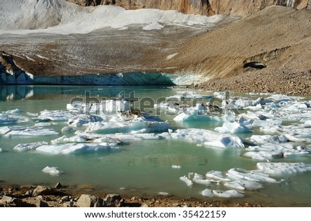 Glacier lake and ice under mountain edith cavell in august, jasper national park, alberta, canada