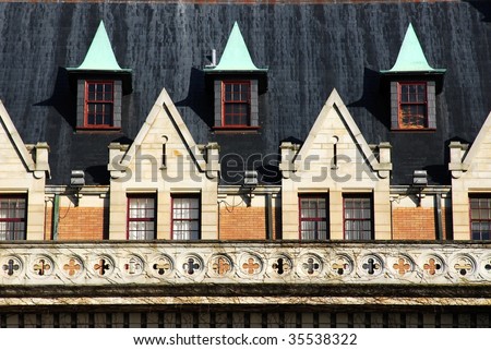 The beautiful roof and windows of the historic empress hotel in Victoria, British Columbia, Canada
