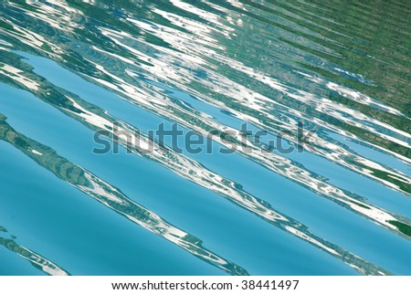 Abstract background of water pattern while cuising on the upper waterton lake, waterton lakes national park, alberta, canada