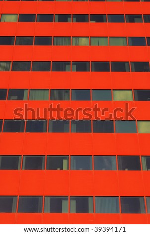 Abstract background of a red modern office building in edmonton downtown, alberta, canada