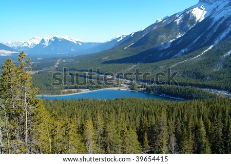 spring view of canadian rockies and river on highway 11, alberta, canada
