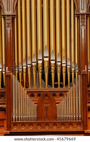 Detail look of a historic pipe organ in church