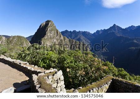 View at the lost Inca city Machu Picchu with the Huayna Picchu mountain in the back - Andes - Peru - South America