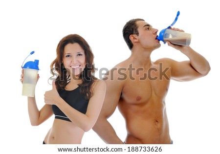 Athletic young man and woman with protein shake bottle. Isolated on white background