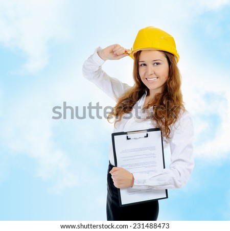 Businesswoman with construction helmet and clipboard. on blue background