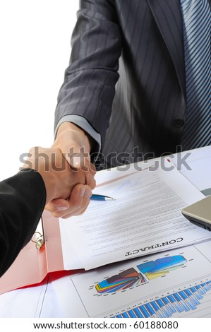 Handshake of two business partners. Isolated on white background