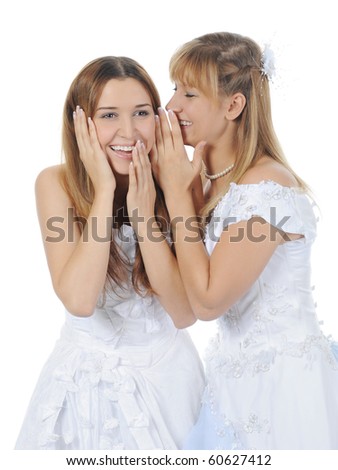 young bride whispers to friend. Isolated on white background